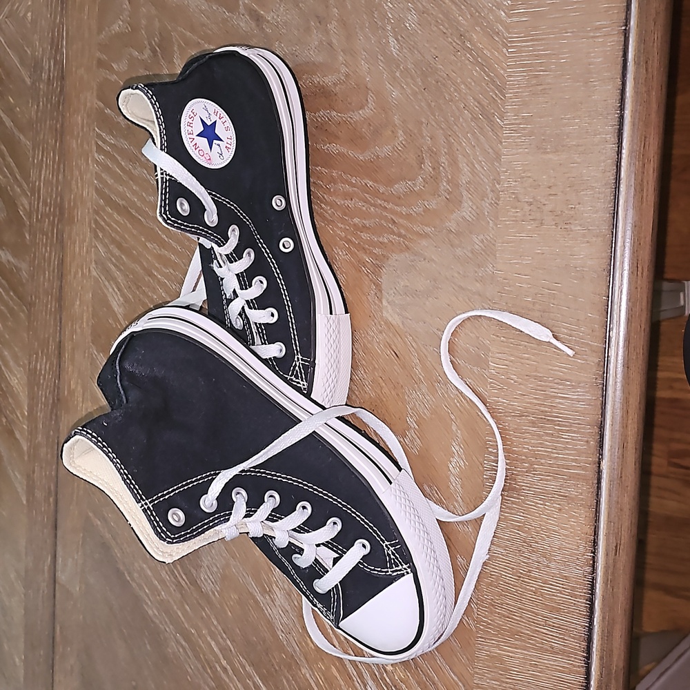 Girls mid platform Converse High top.  Very minimally worn.  Excellent condition